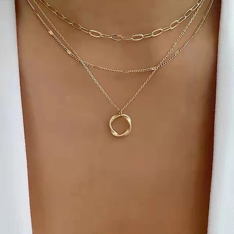 Vintage necklace of layered chains with pendant
