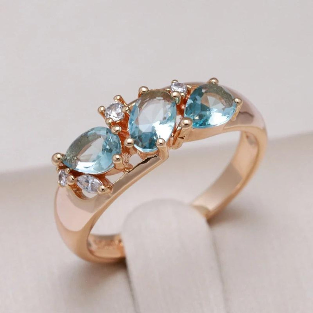 Gold-Tone Ring with Blue Zirconia