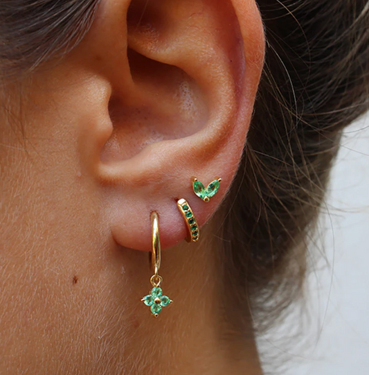 18-karat golden stud and drop earrings