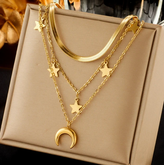 18-karat triple golden necklace with stars, choker, and moon