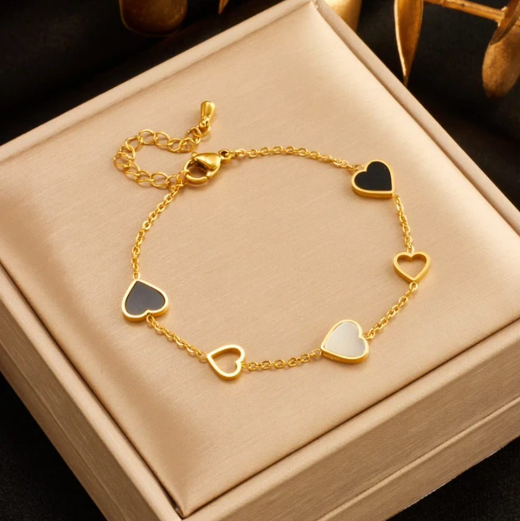 Gold-Plated Bracelet with Black and White Hearts