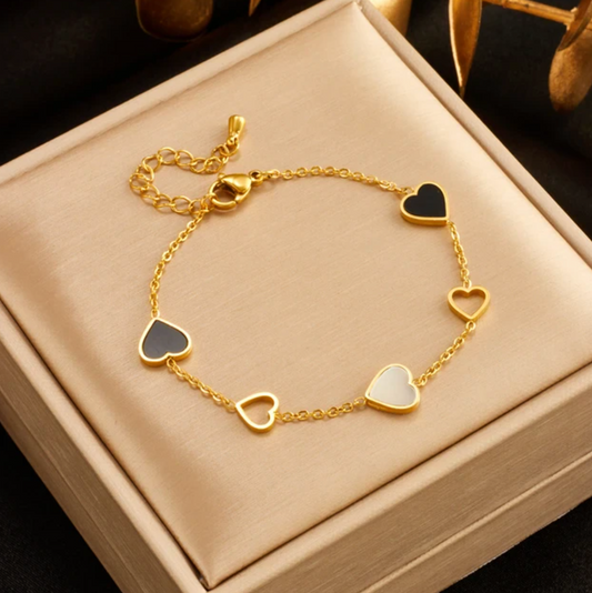 Gold-Plated Bracelet with Black and White Hearts