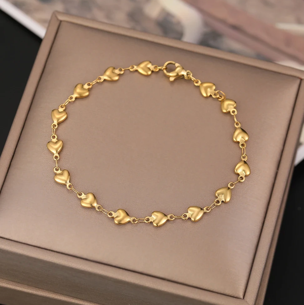 Gold-Plated Bracelet with Multiple Small Hearts