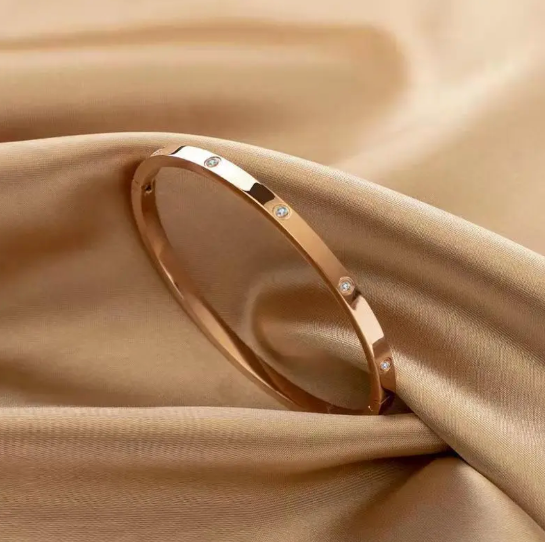 Gold-Tone Bracelet with Inlaid Zirconia Accents