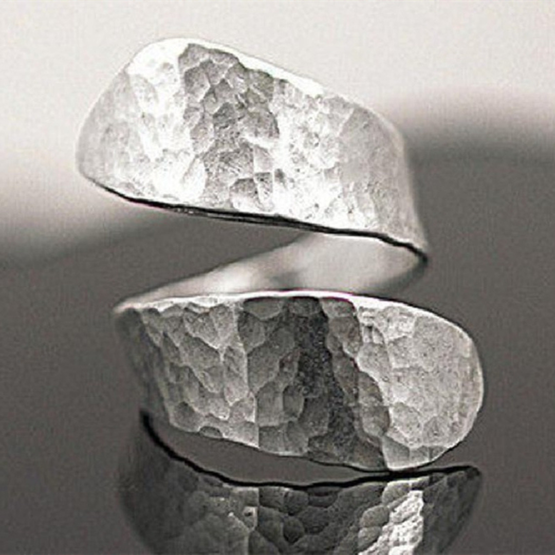 Modernist spiral ring with silver relief