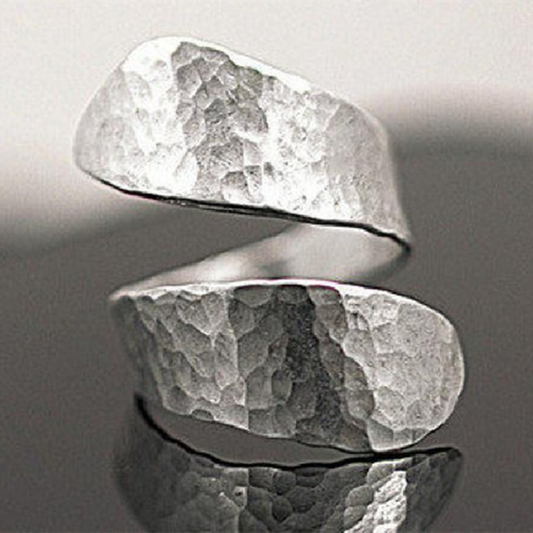 Modernist spiral ring with silver relief