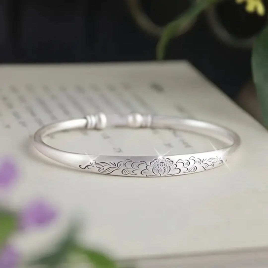 Silver flower path bracelet